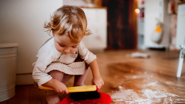 toddler doing chores